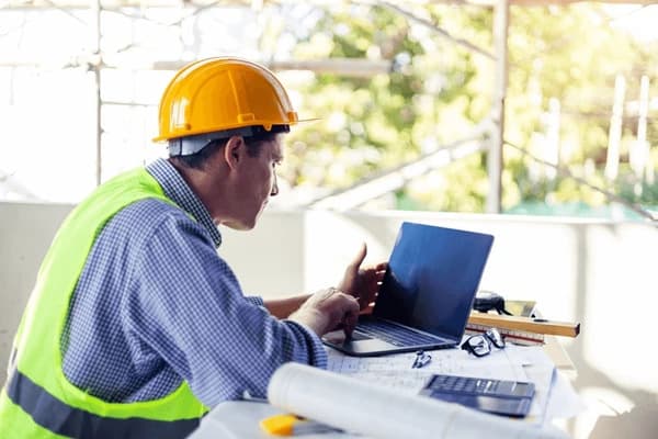 Construction plans laid out on a desk
